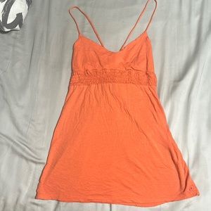 A adjusted O’Neill orange medium tank top